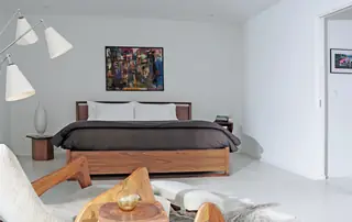 Mid-century modern bedroom with wood platform bed
