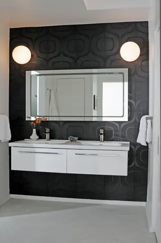 Modern bathroom with white floating double vanity