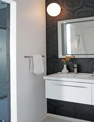 Modern bathroom with white floating vanity