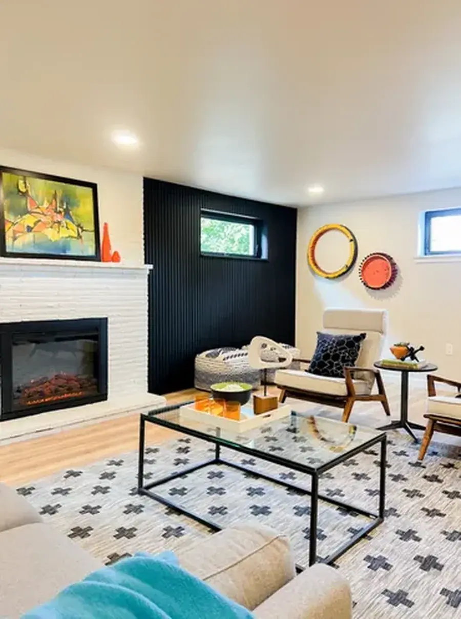 Staged living room with a dramatic fireplace